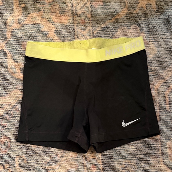 Nike Pants - ✨✨Nike Black Shorts with Yellow Band